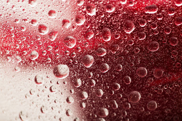 water droplets on a red background. macro