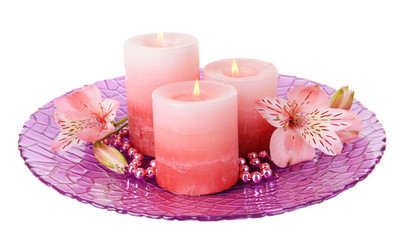 Fototapeta na wymiar Beautiful candles with flowers isolated on white
