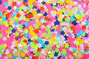 Confetti on pink background