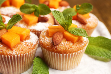 Tasty pumpkin muffins, close up