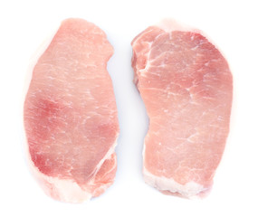 Raw meat steaks isolated on white