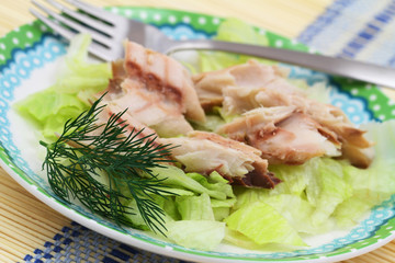 Smoked mackerel on iceberg lettuce