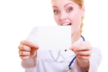 Woman in lab coat. Doctor or nurse with blank card isolated