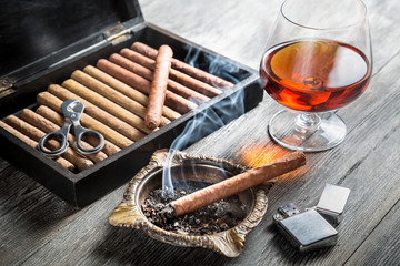 Aroma of cognac and cigar fuming
