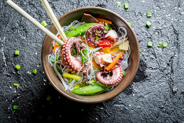 Vegetables with noodles and octopus