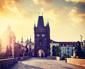 Naklejka na ściany i meble Charles bridge tower in Prague on sunrise