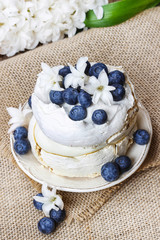Meringue decorated with blueberries