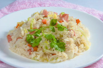 Fried rice with sausage on dish