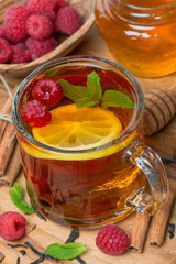 black tea with lemon, mint, raspberry and cinnamon