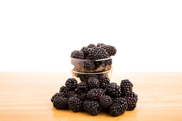 Glass Cup of Blackberries on Table
