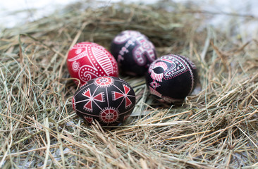 Colorful Easter eggs in a little basket.