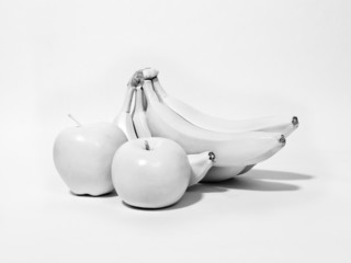 White Fruits on White, two apples and a bunch of bananas are all white against a white background.