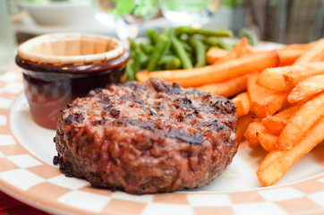 steak beef meat with tomato and french fries