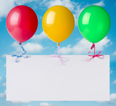 Flying banner with balloons on heaven background
