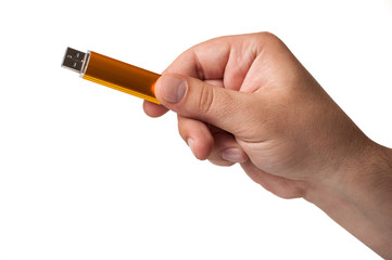 Flash memory hold by hand, isolated on a white background.