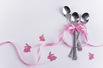 Three dessert spoons with pink decoration and bunnies for kid's