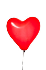 Obraz na płótnie Canvas heart shaped red balloon