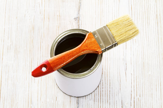 Paint Brush And Varnish Can, Paintbrush And Wood Lacquer