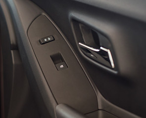 Obraz na płótnie Canvas Door handle inside the car.