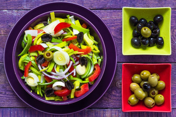 Fresh colorful vegetable salad platter wooden table