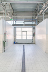 Hand car wash facility. Entrance view.