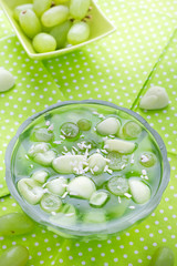 Delicious fruit jelly grapes dusted coconut shreds