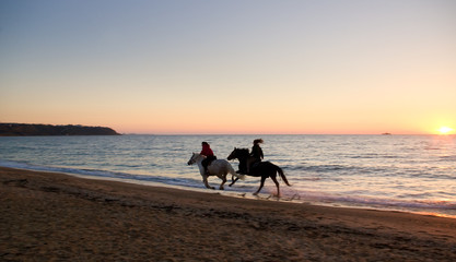 on Horseback at sunset