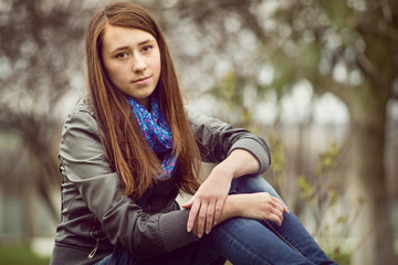 Attractive young girl enjoying a quiet moment