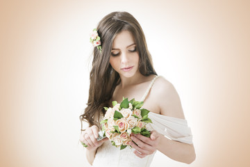 Beautiful bride with wedding bouquet