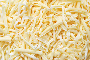 Grated cheese for a background