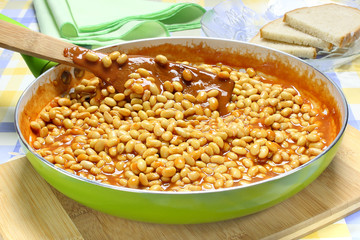 Soybeans with tomato sauce in the frying pan