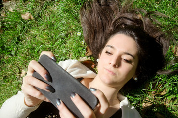 young girl in relax with smartphone