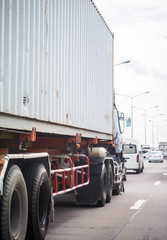 Truck with container on the road