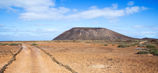 Trail and volcano on Los Lobos in the Canary Islands