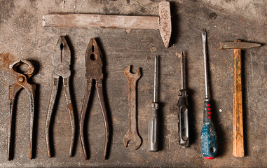 Workbench with rusty tools