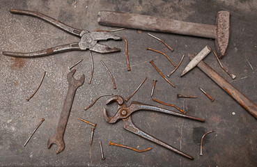 Workbench with rusty tools