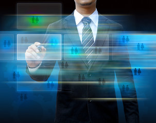Businessman writing on the screen