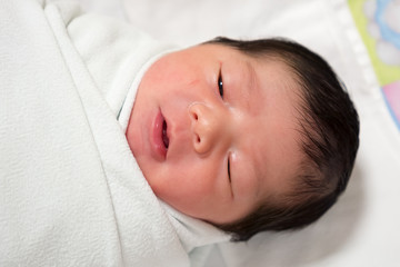 Fototapeta na wymiar First day newborn baby
