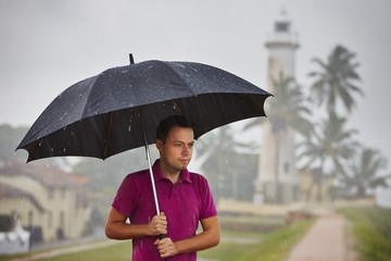 Man in heavy rain