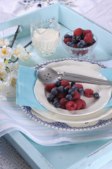 Beautiful vintage style aqua dessert tray with berries