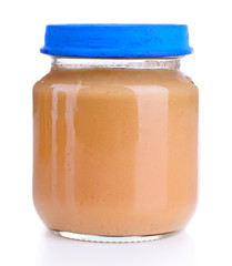 Baby food in glass jar, isolated on white