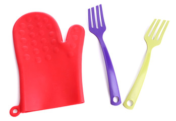 Oven glove and kitchenware isolated on white