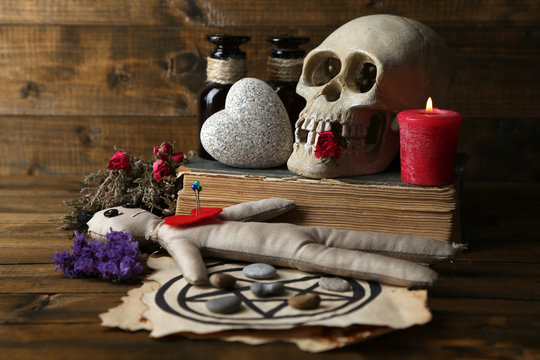 Conceptual photo of love magic. Composition with skull, voodoo