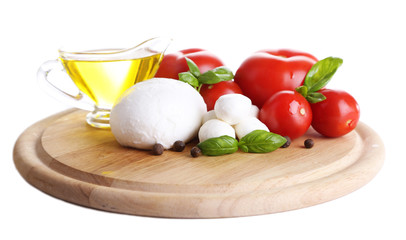 Composition with tasty mozzarella cheese balls, basil and red