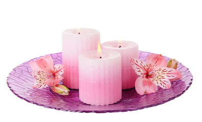 Obraz na płótnie Canvas Beautiful candles with flowers isolated on white