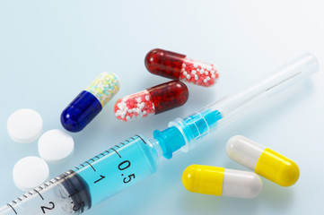 Injector and medicines. Clean and bright medicine image.