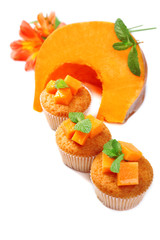 Tasty pumpkin muffins, isolated on white