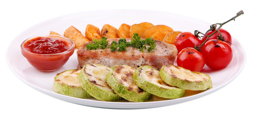 Grilled steak and grilled vegetables on plate, isolated on