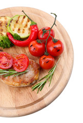Grilled steak with spices, herbs and vegetables
