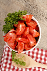 tomatoes cut into wedges in a bowl